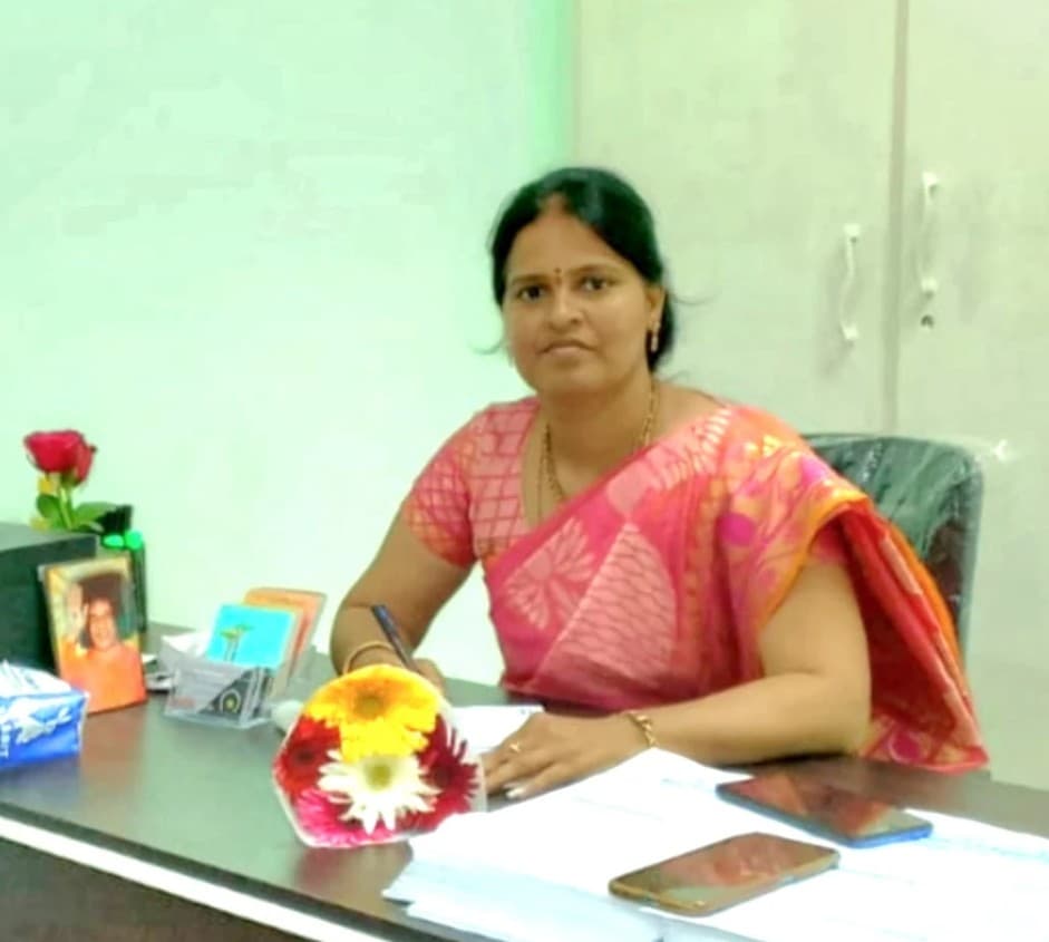 Professional, warm therapist posing with a gentle smile